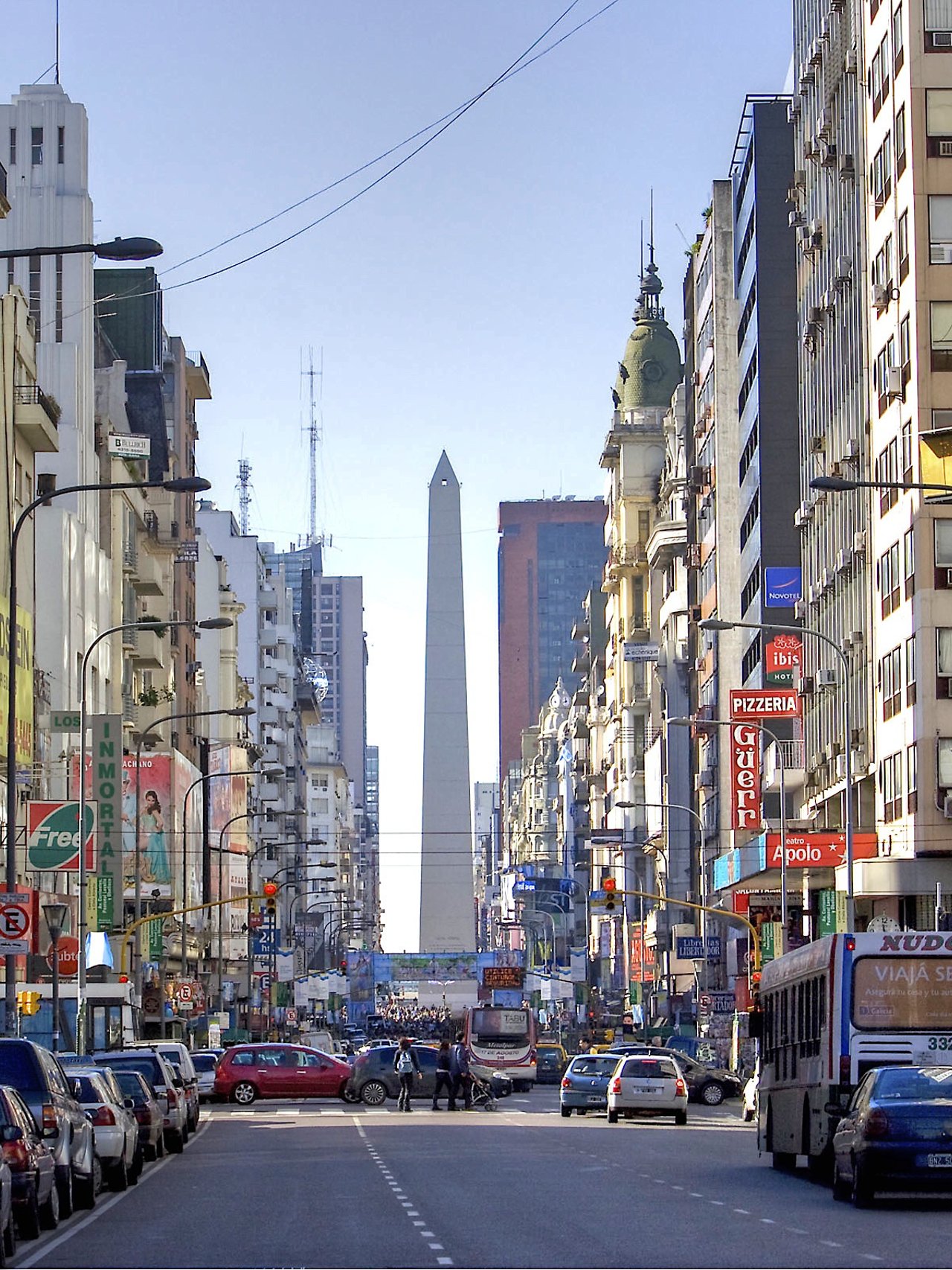 A streetscape of Buenos Aires with the Argentinian obelisk in the background