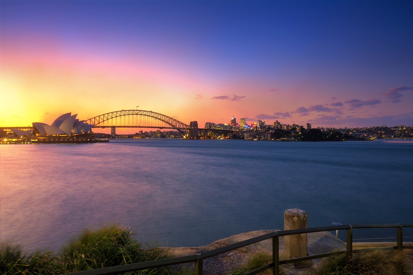 The view of Sydney Harbour from Mrs. Macquarie's Chair at sunset