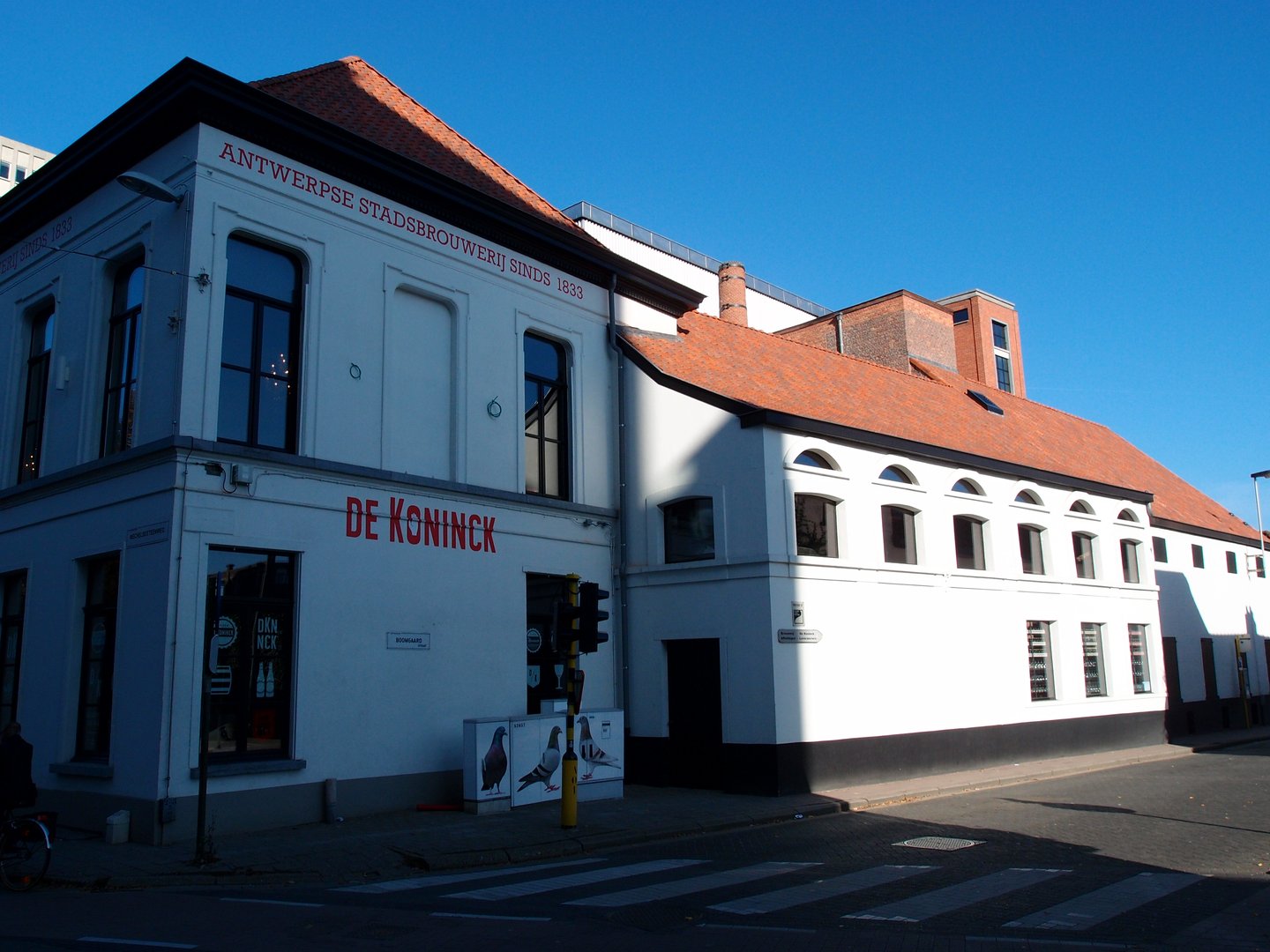 The whitewashed exterior of De Koninck Brewery in Antwerp
