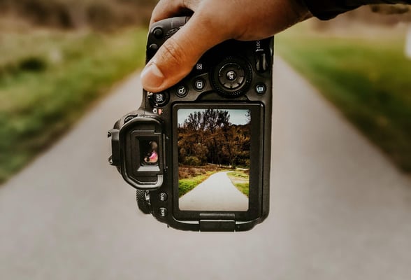Looking through the viewfinder of a camera