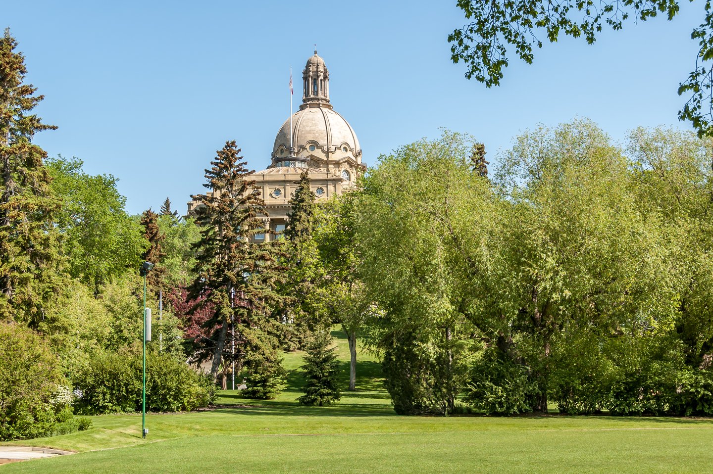 Grass and trees outside the Legislature Building in Edmonton