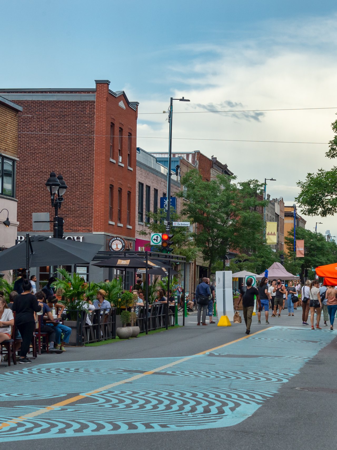 People sitting outside restaurants in Montreal