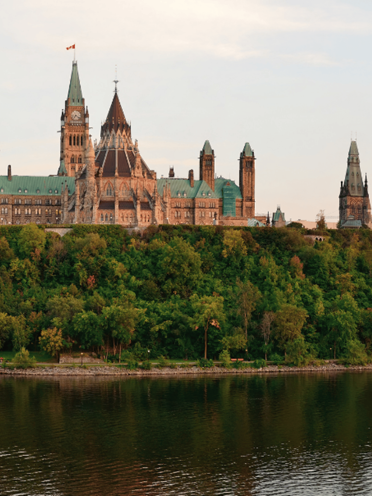 Ottawa sunset panorama over river with historical architecture