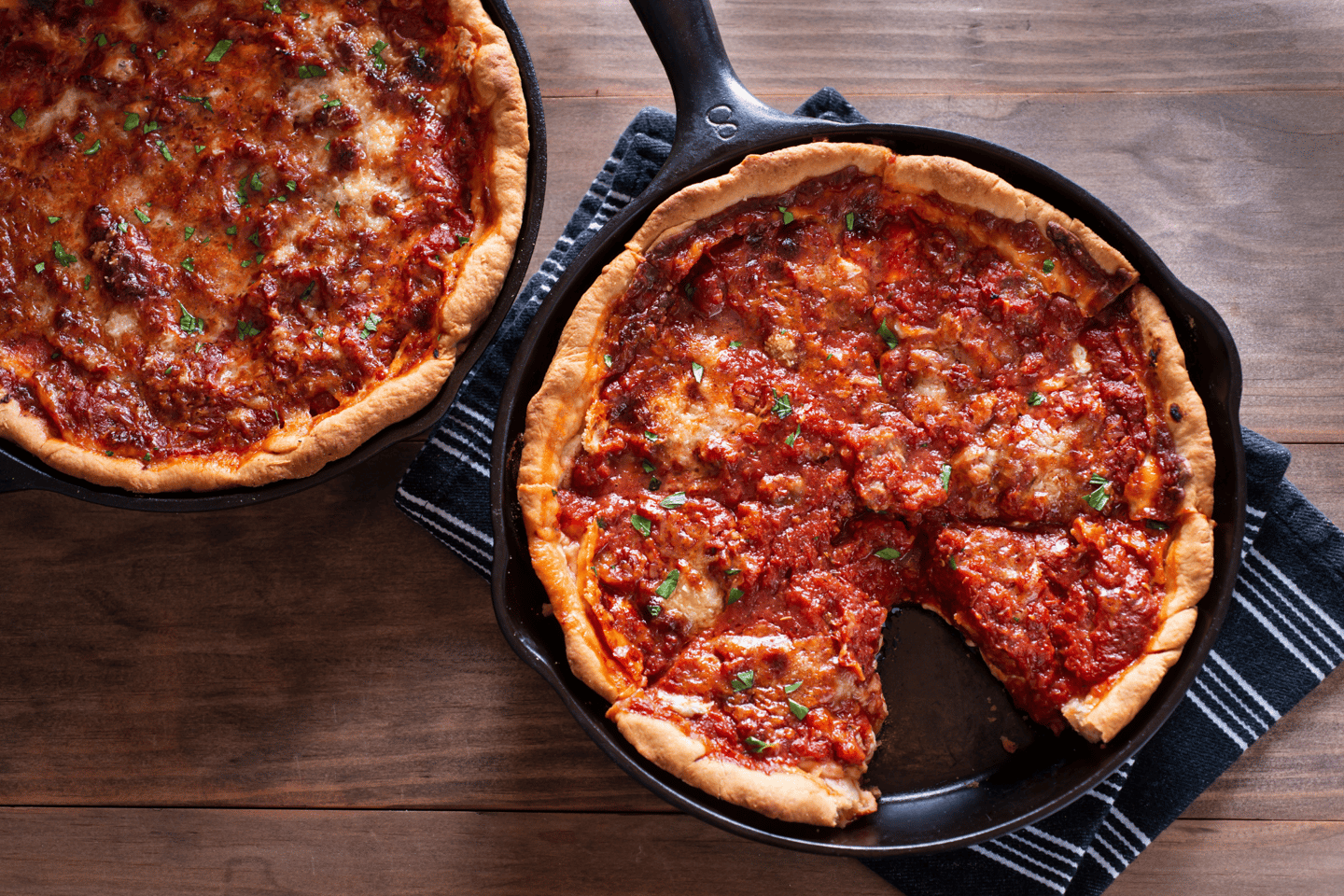 Chicago-style deep dish pizza in skillets
