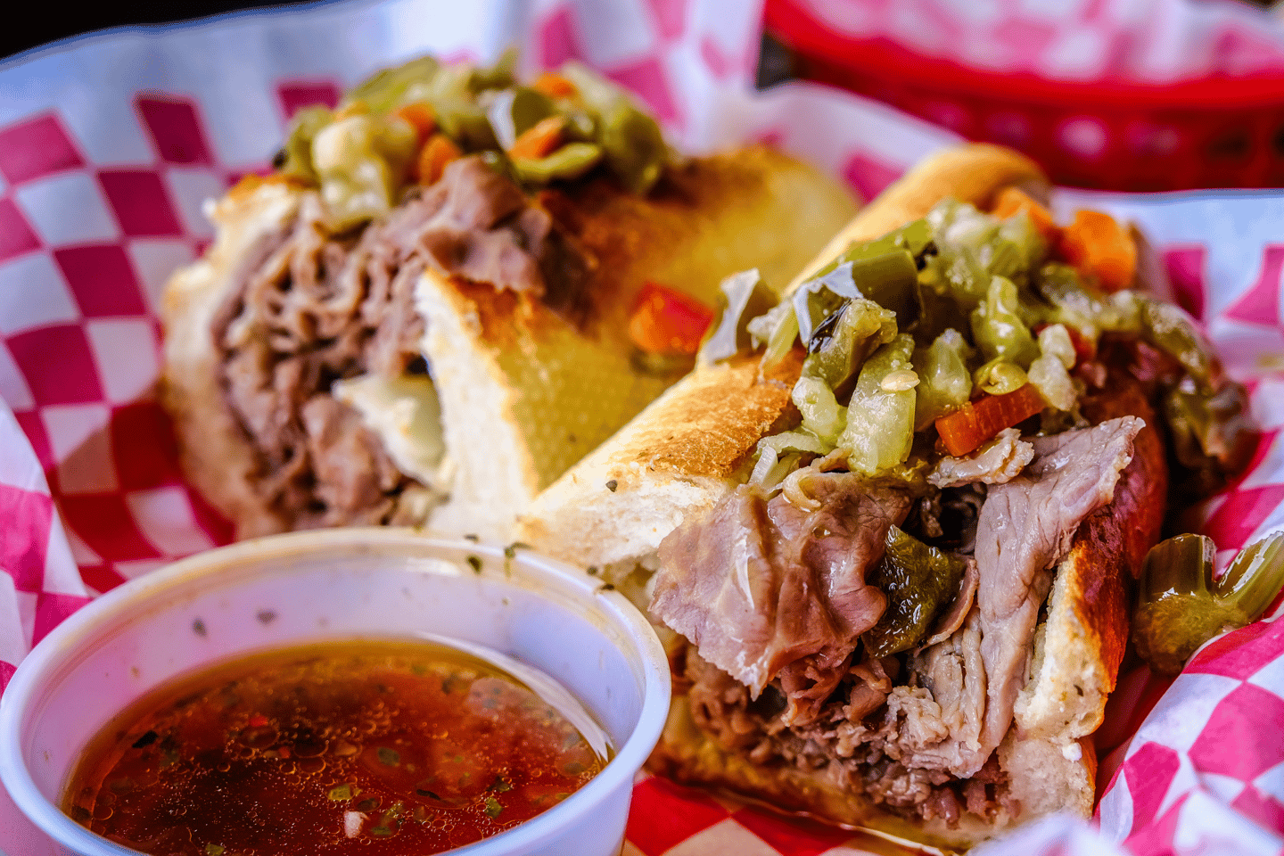 Italian Beef Sandwich with peppers, onions and au jus