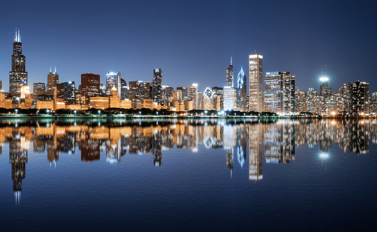 Chicago night skyline across Lake Michigan
