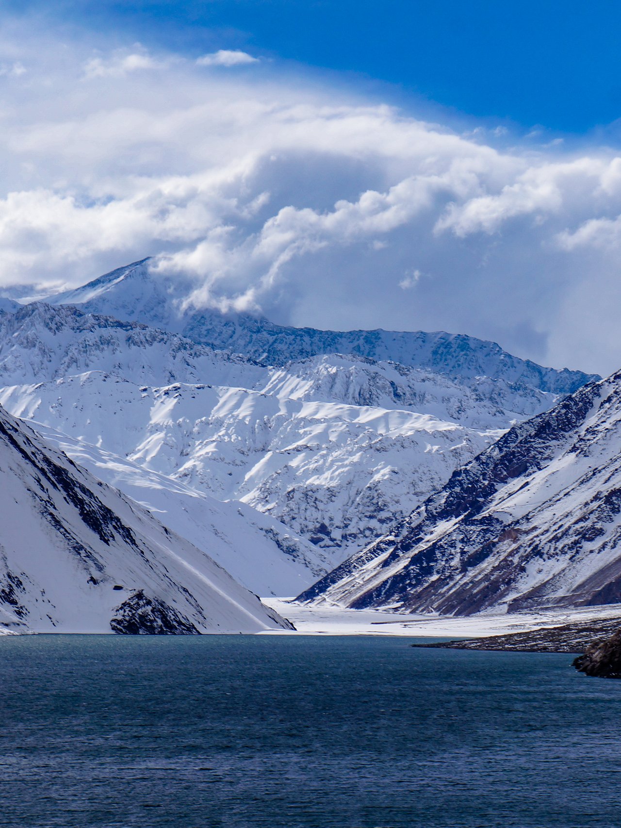 Water with mountains in the background