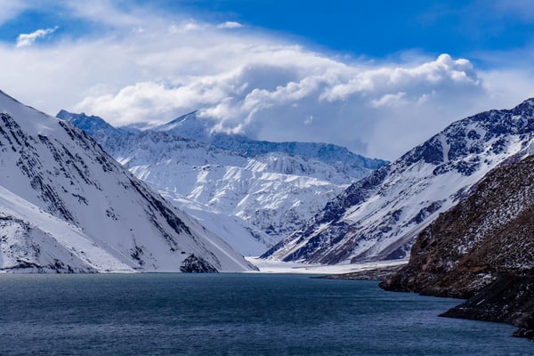 Water with mountains in the background
