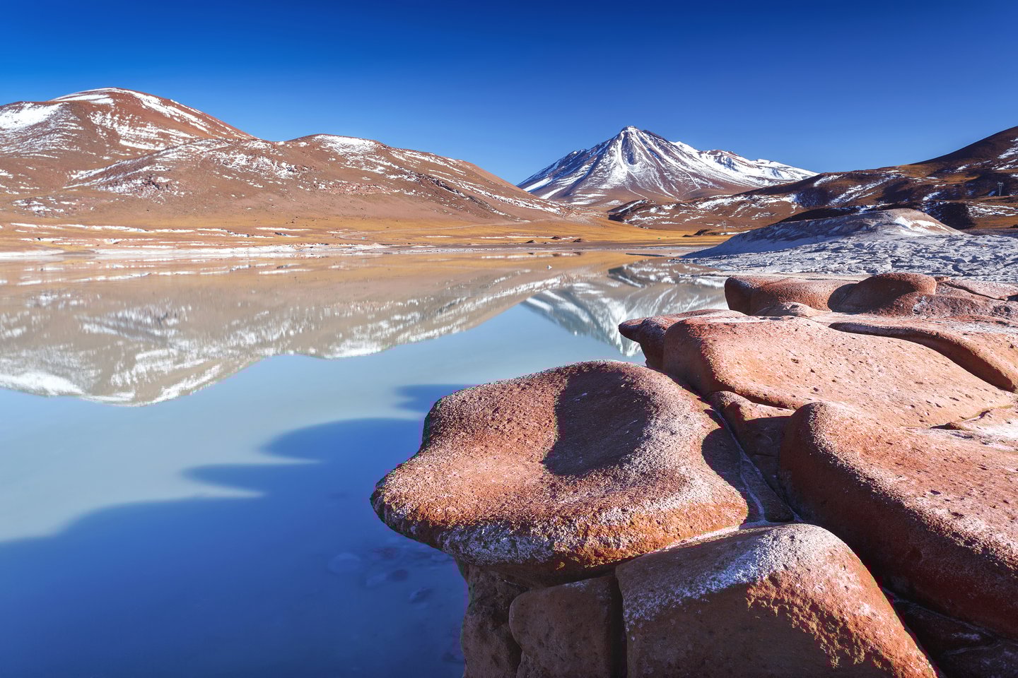Mountain reflections at Piedras rojas in the Atacama desert, Chile