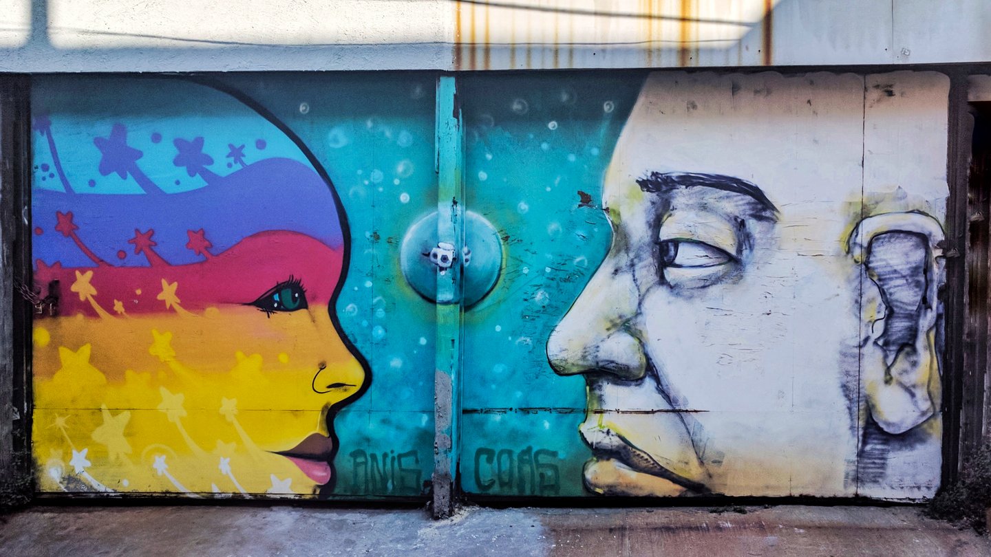 Street art of two faces in Valparaiso, Chile