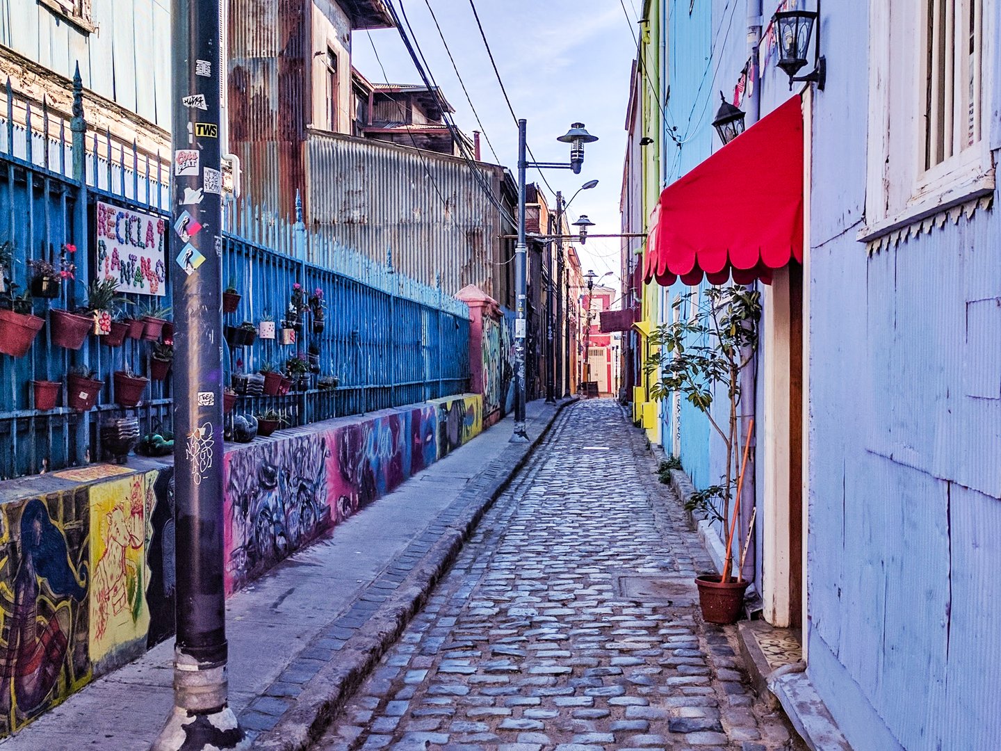 An art-filled laneway in Valparaiso, Chile