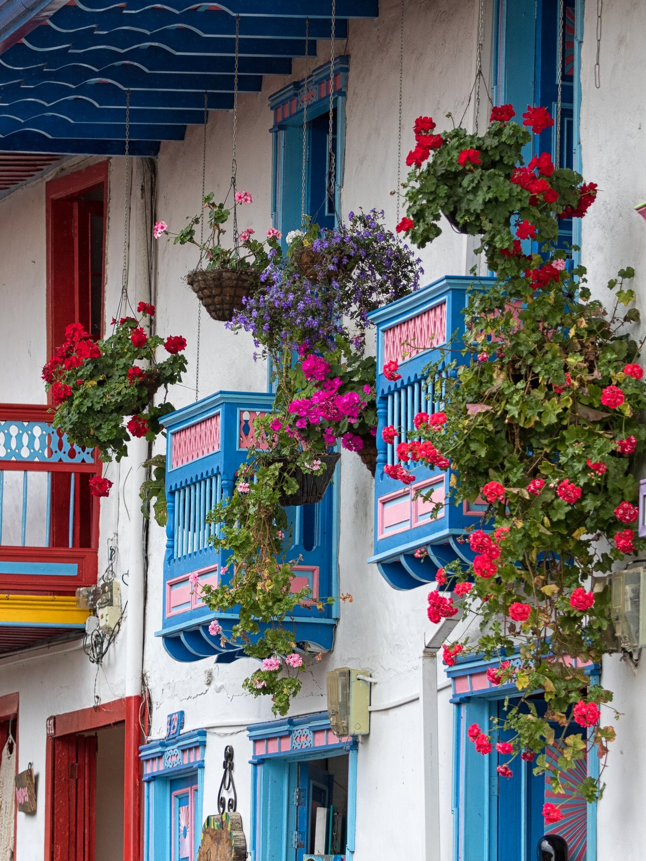 Colourful balconies surrounded by flowers in Salento, Colombia