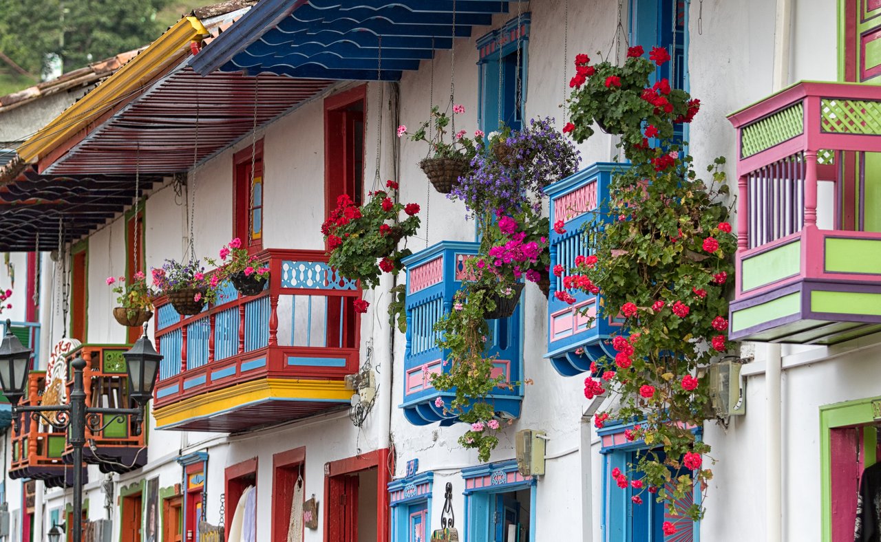 Colourful balconies surrounded by flowers in Salento, Colombia