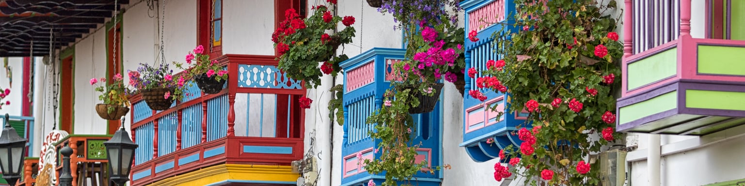Colourful balconies surrounded by flowers in Salento, Colombia