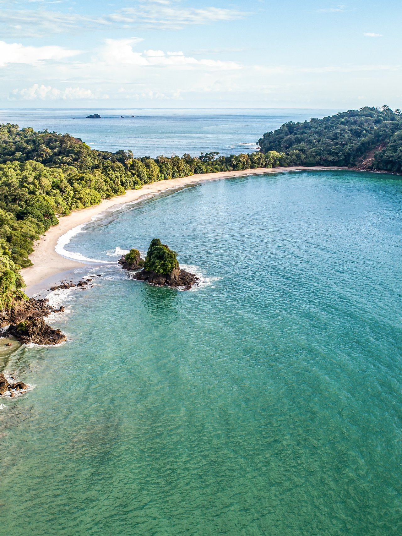 An aerial view of Espadilla Beach and the coastline near Manuel Antonio National Park