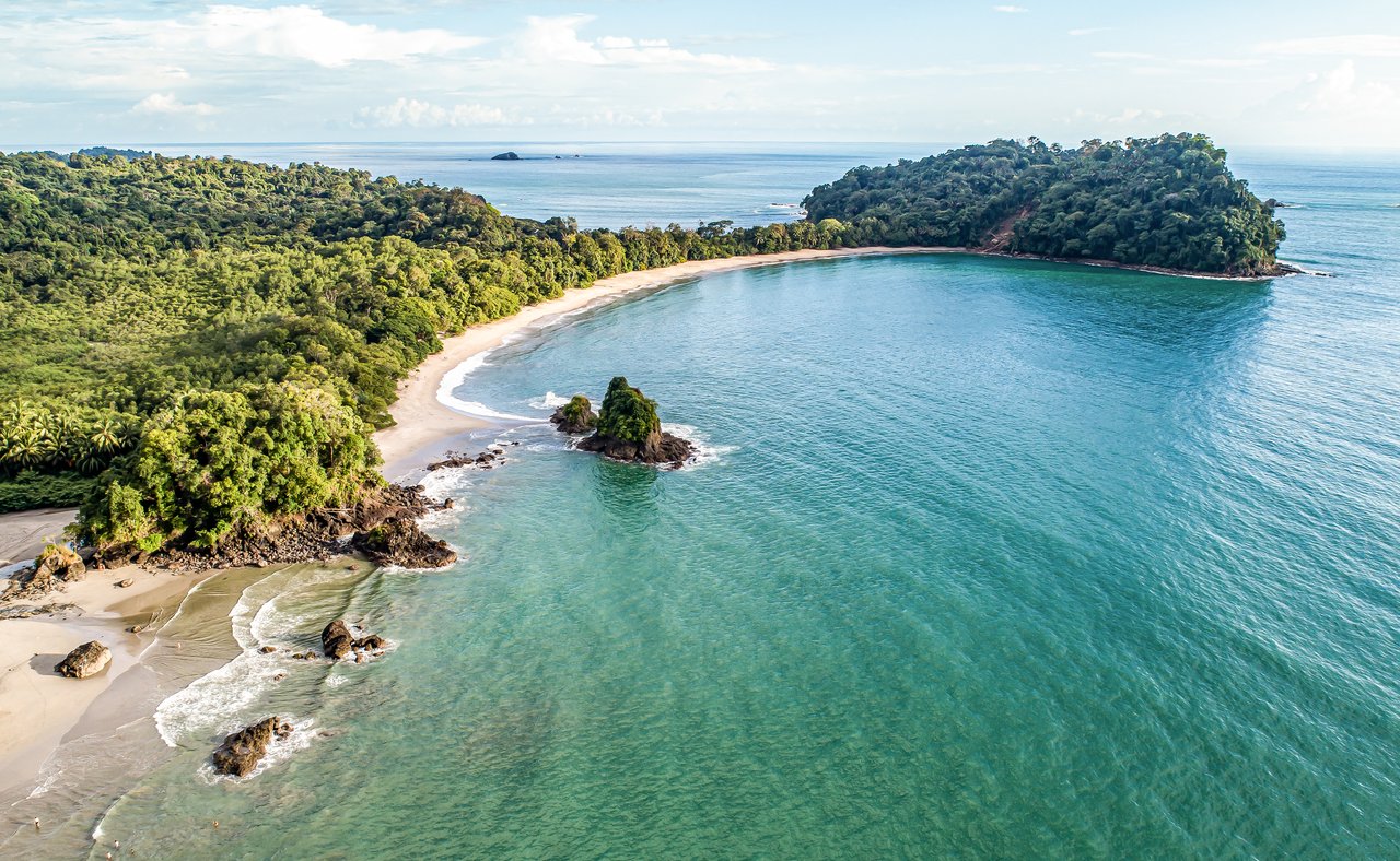 An aerial view of Espadilla Beach and the coastline near Manuel Antonio National Park