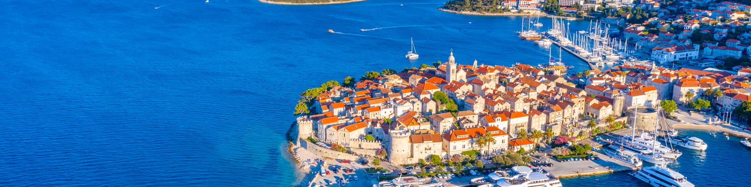 An aerial view of Korcula's old town and nearby islands