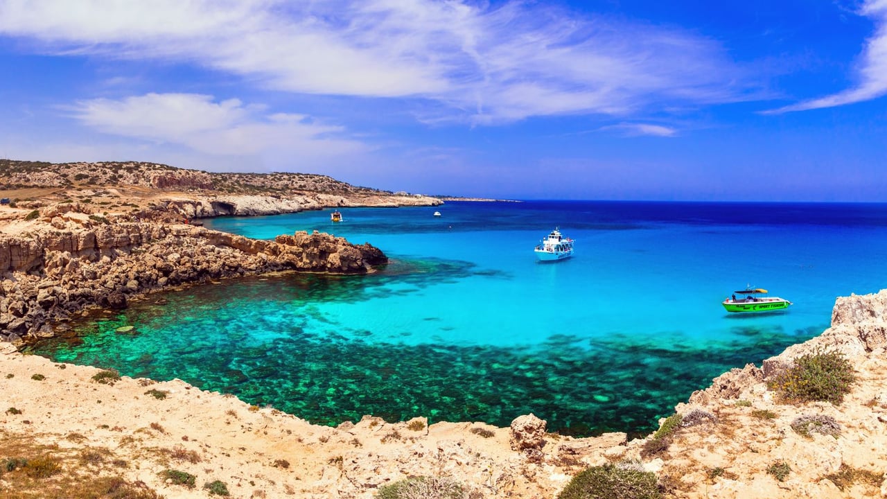 A startlingly blue lagoon at Cape Greko, Cyprus