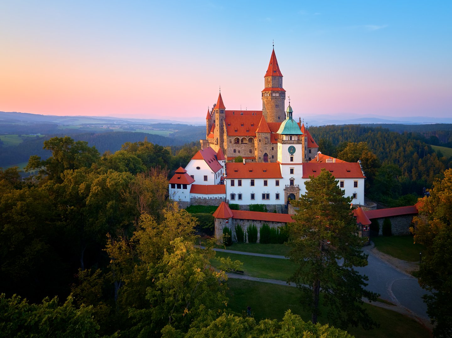 An aerial view of the beautiful Bouzov Castle at sunset