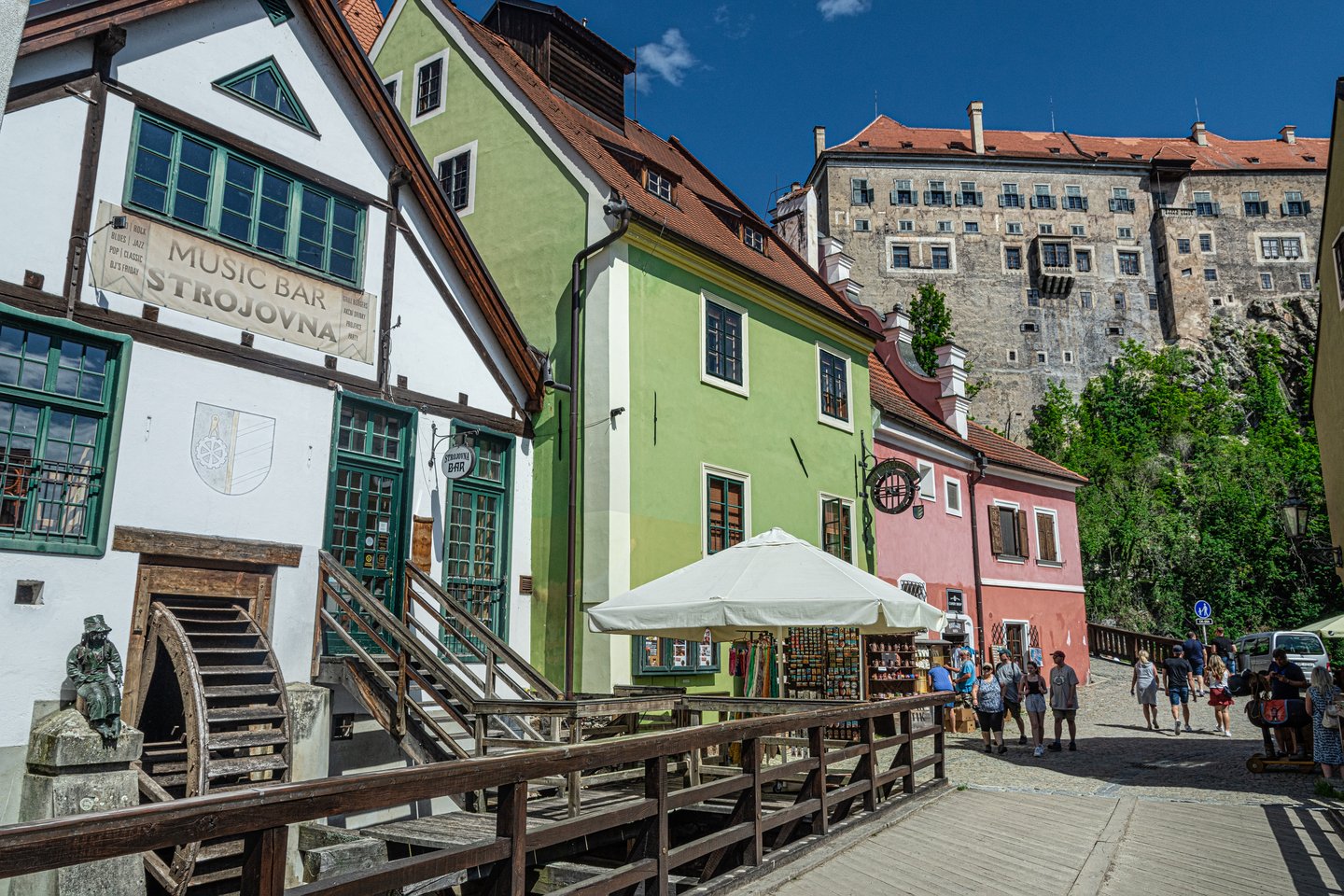 A quaint street lined with colourful buildings in Cesky Krumlov