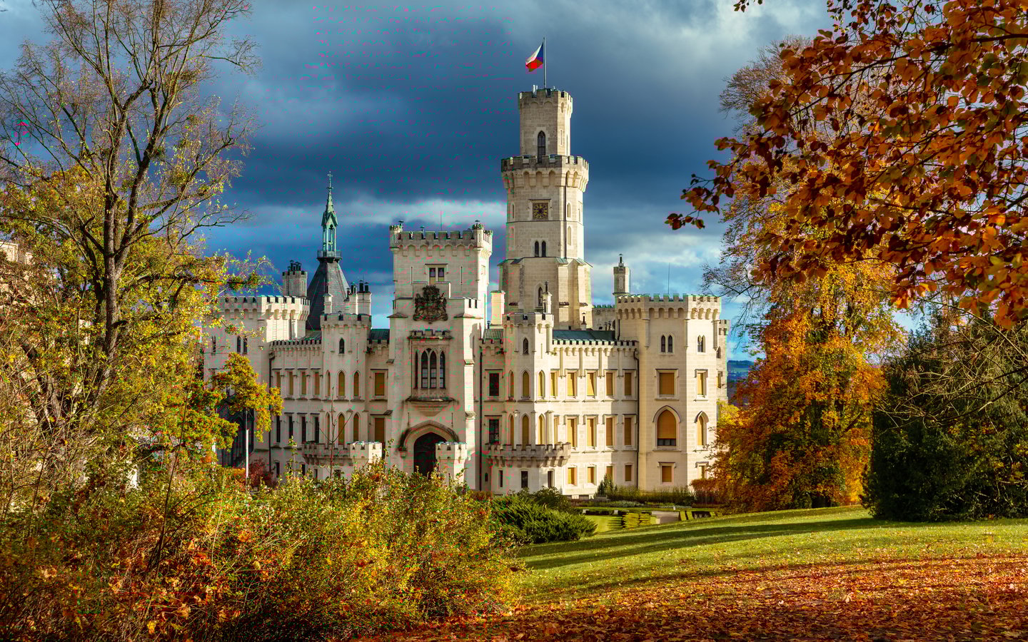 Hluboká Castle surrounded by autumn leaves