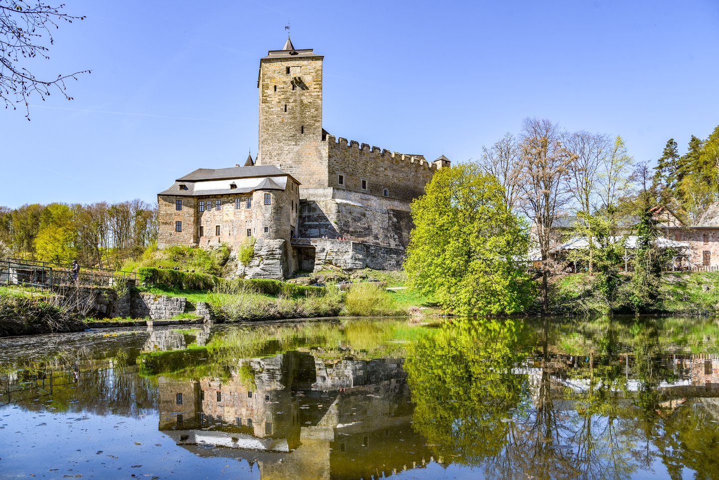 Kost Castle reflected in the water in Bohemia in the Czech Republic.