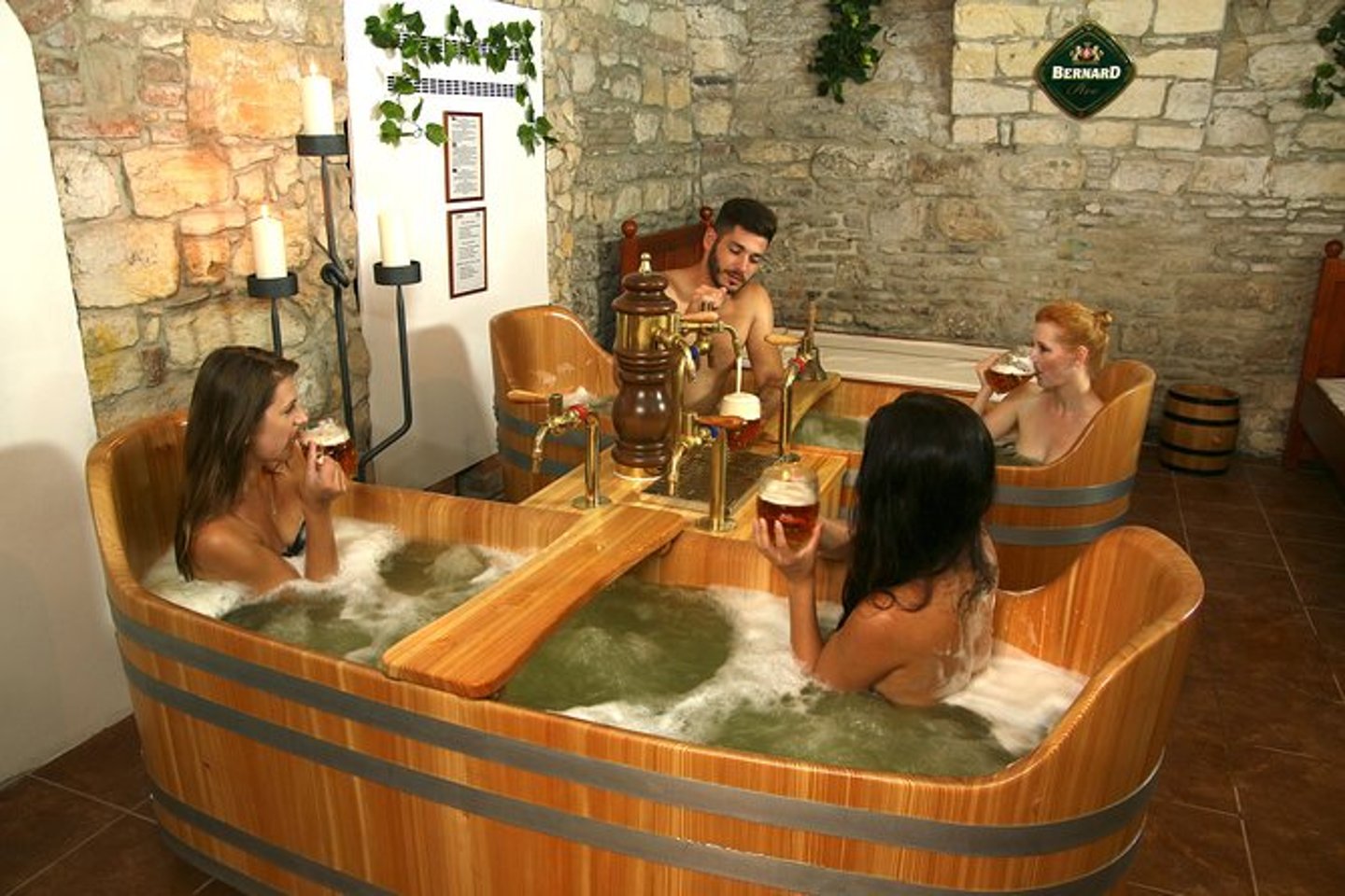 People in a beer spa in Prague