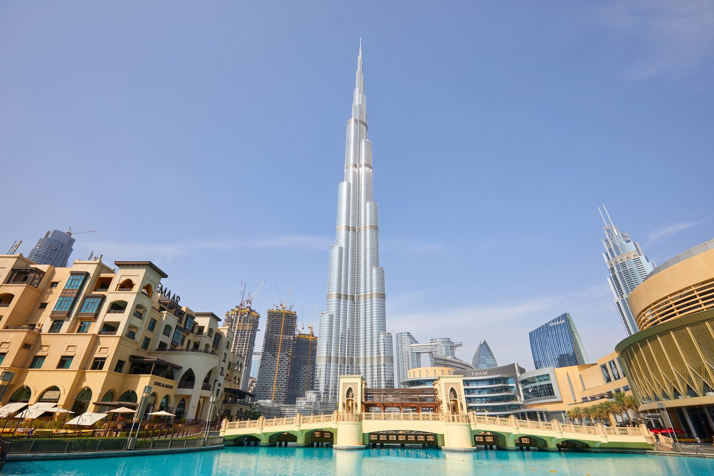  Burj Khalifa skyscraper, Souk al Bahar and Dubai Mall in a sunny day 