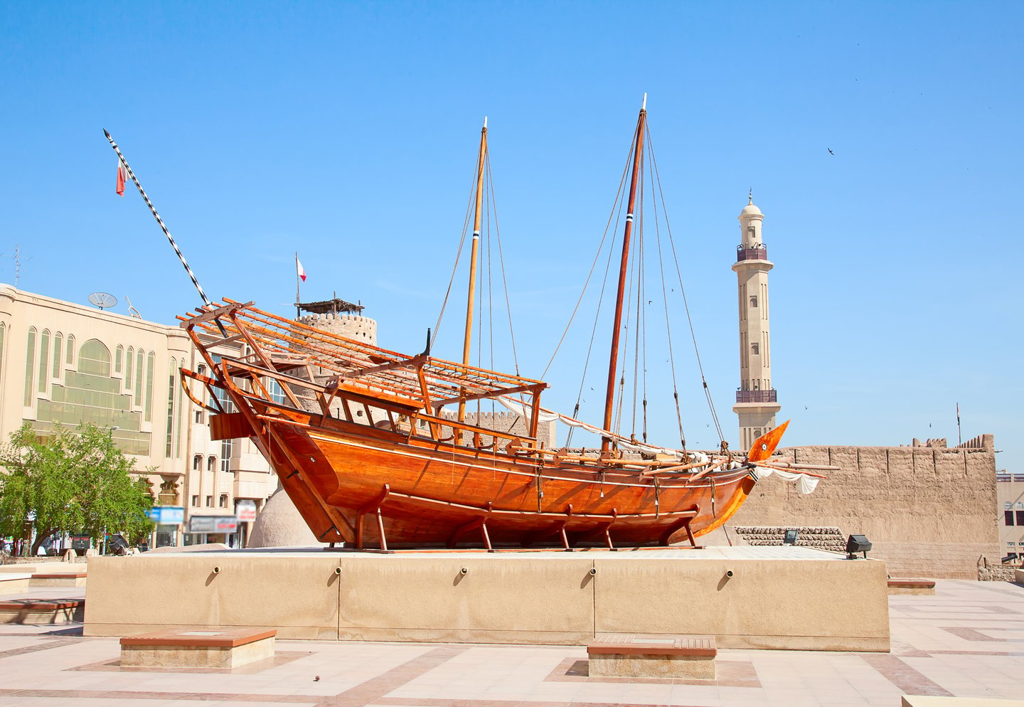 A traditional boat at the Dubai Museum on a sunny day