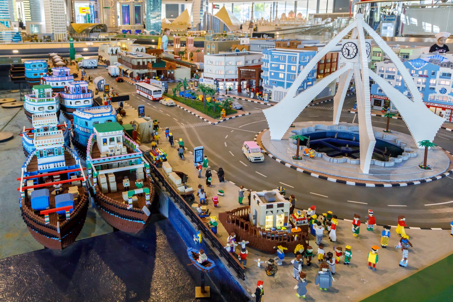 An lego exhibition of ships near a harbour at Legoland, Dubai