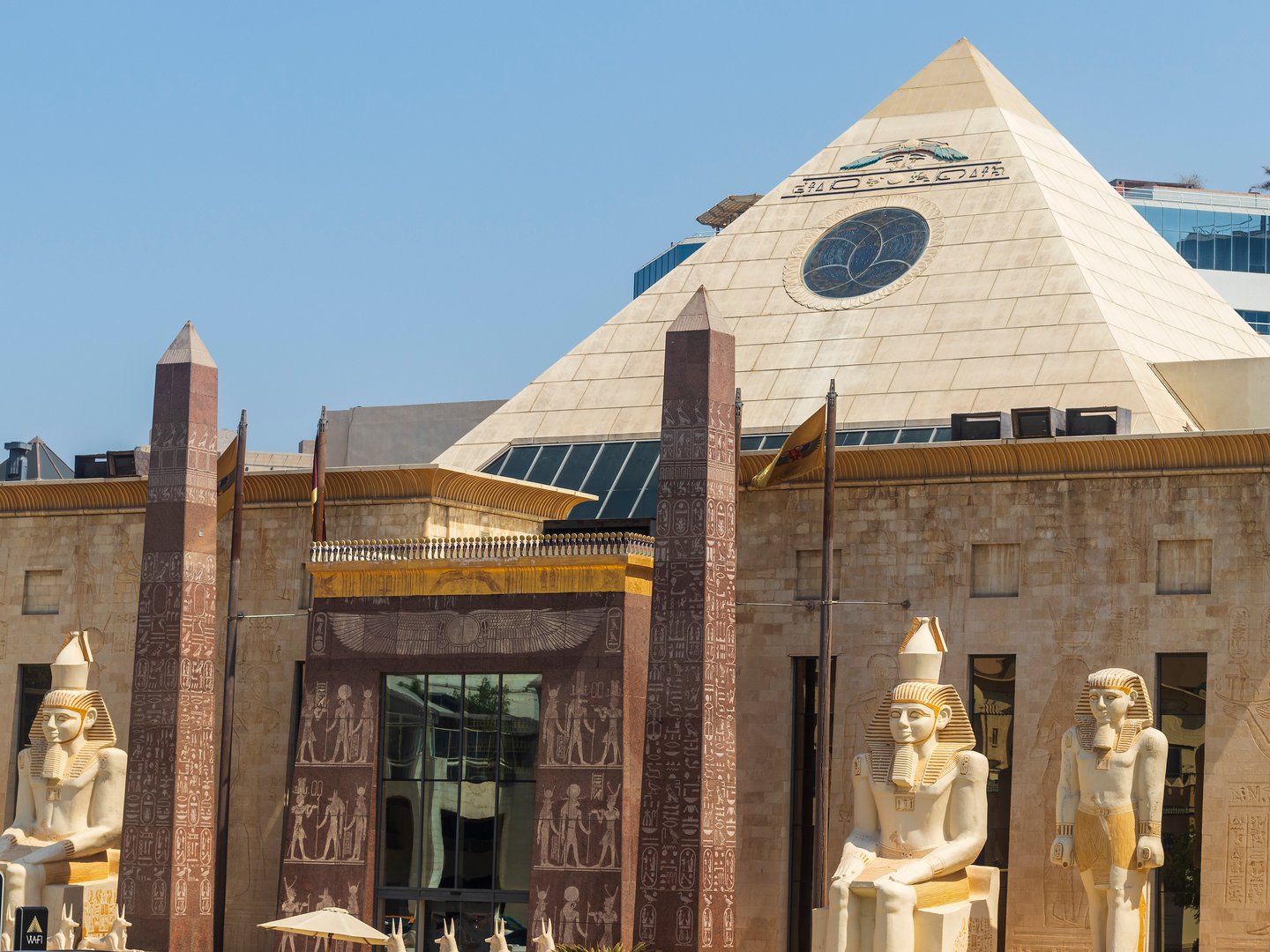 The exterior of Wafi Mall, which looks like an Egyptian tool with a pyramid and statues