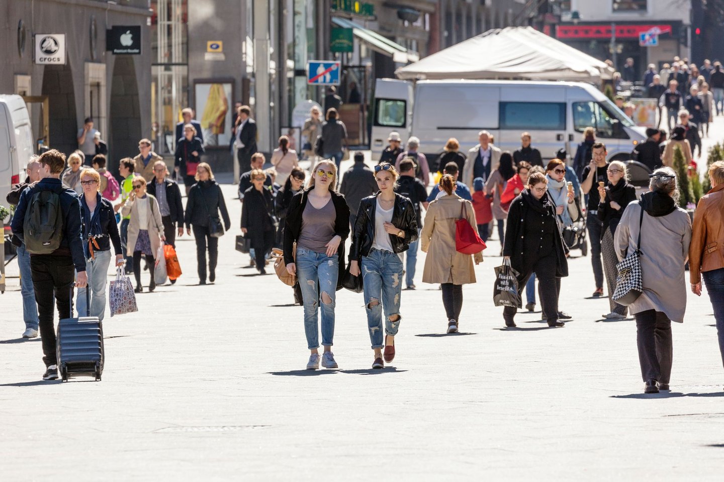  People walking down the street in the center of Helsinki, Finland