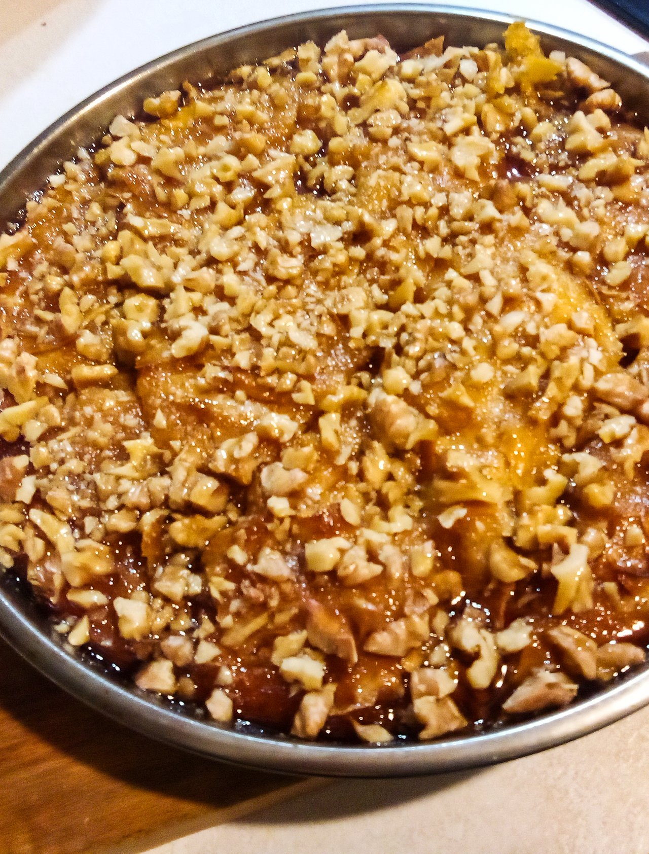 A freshly made pacavure cooling on a wooden board