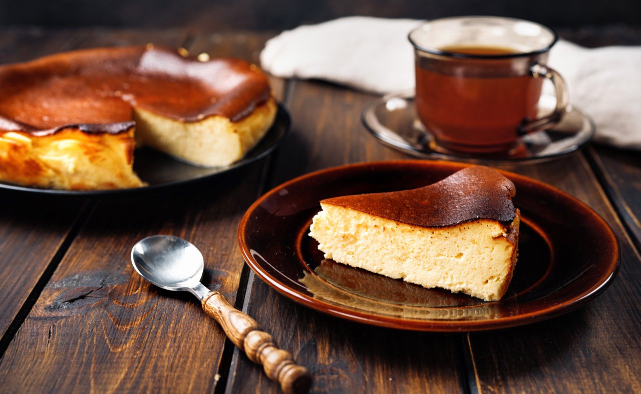 Slice of burnt Basque cheesecake