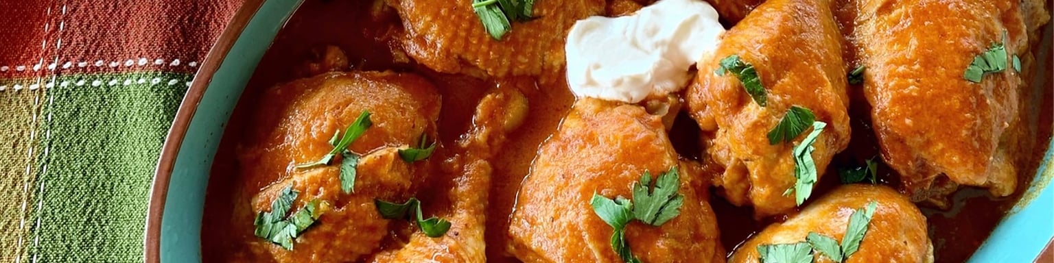 Chicken Paprikash with dumplings and cucumber salad
