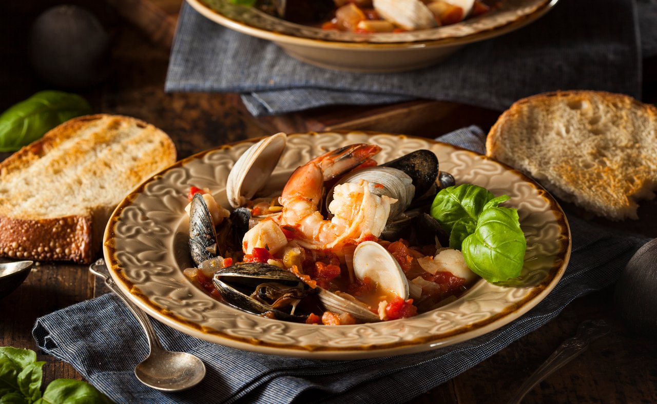 Cioppino seafood stew served with crusty bread