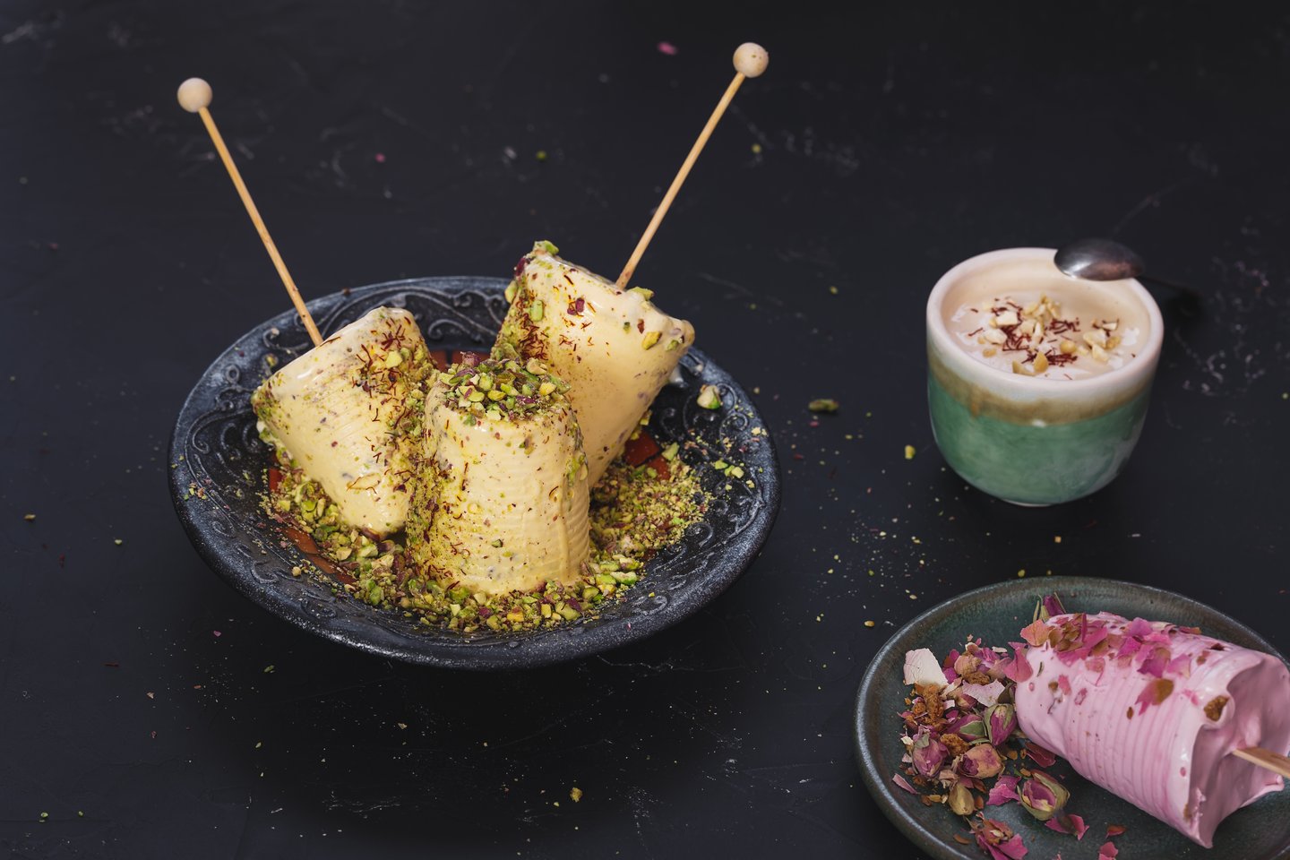 Plain and flavoured kulfi served with nuts and dried fruits