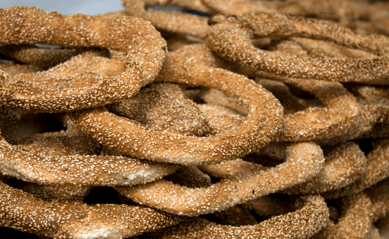 Freshly baked koulouri on a stand in Greece