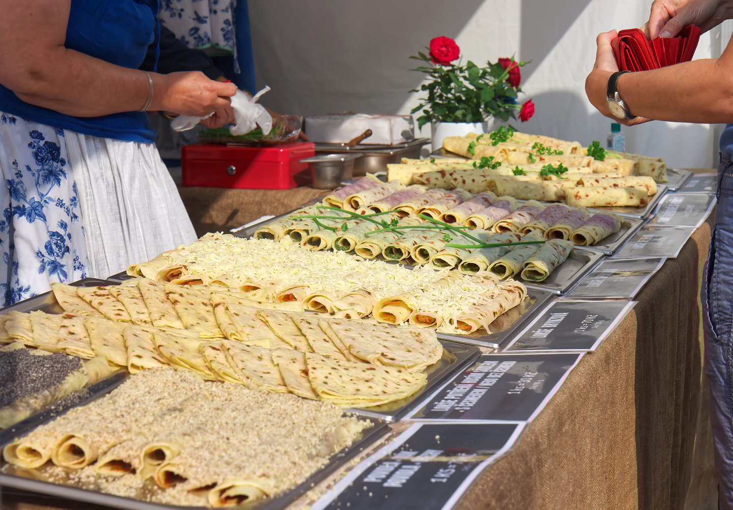 A stall selling lokše (Slovak potato pancakes) with a variety of fillings