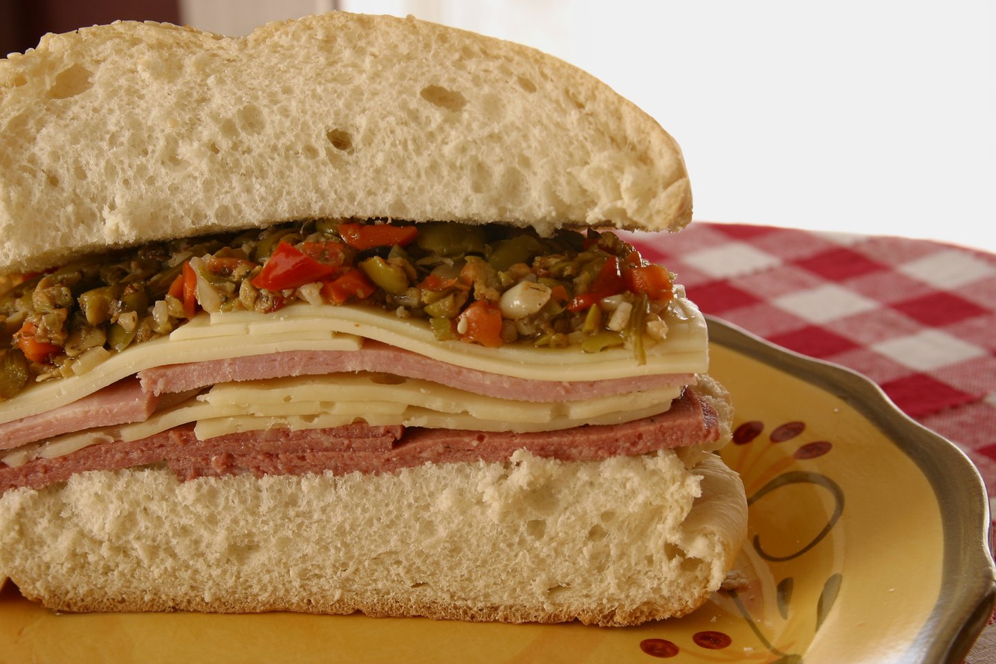 A close up of a mufaletta sandwich