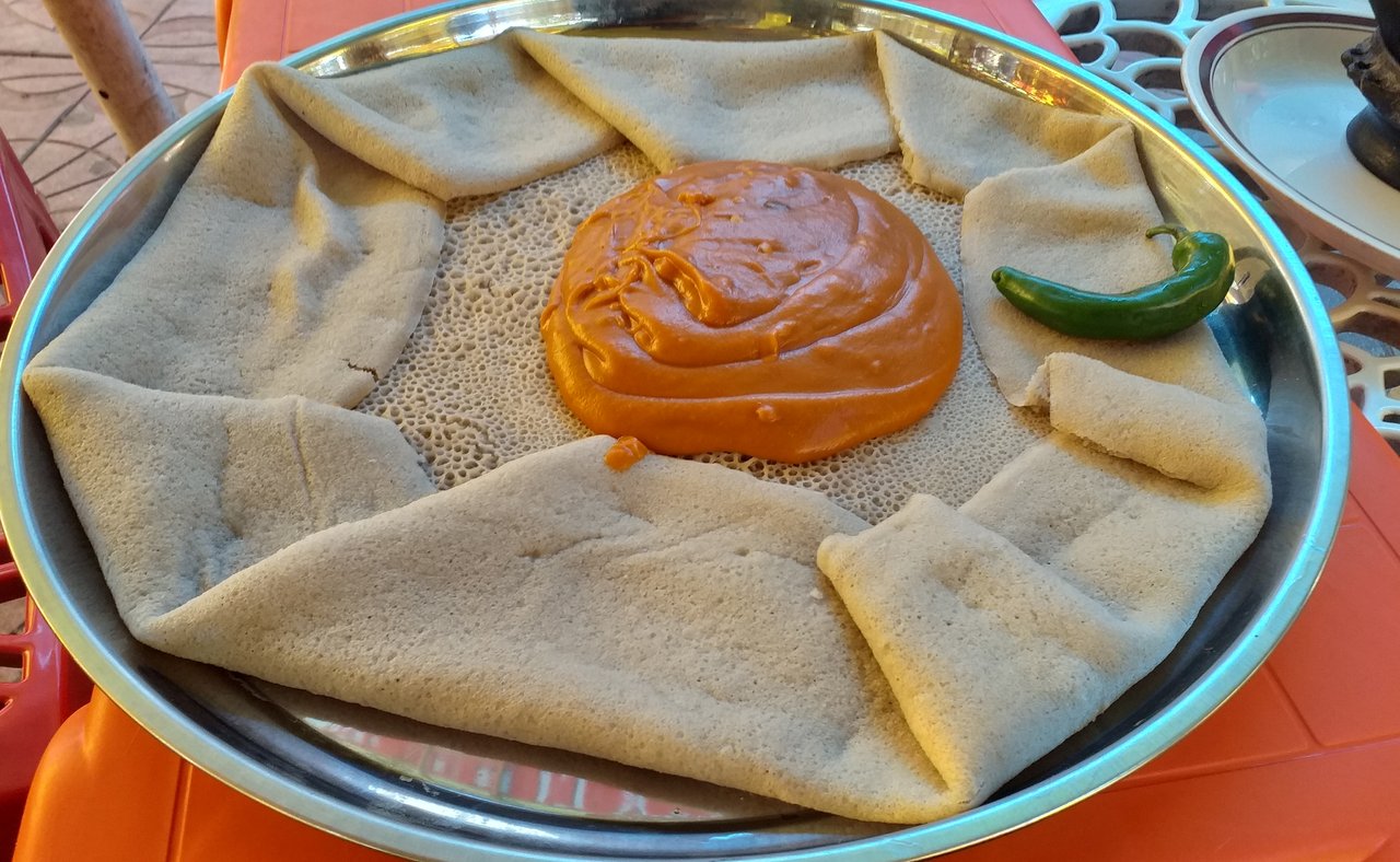 Shiro Wat, Ethiopian chickpea paste, served with injera, a sour flatbread