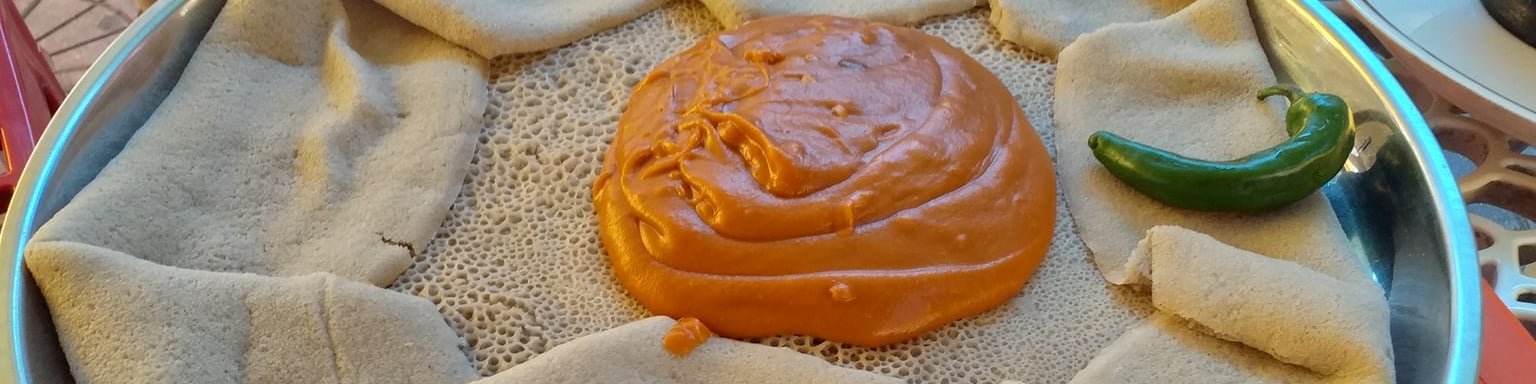 Shiro Wat, Ethiopian chickpea paste, served with injera, a sour flatbread
