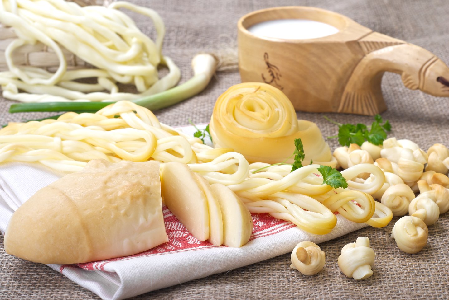 A selection of Slovak cheeses including oštiepok, parenica and korbáčiky