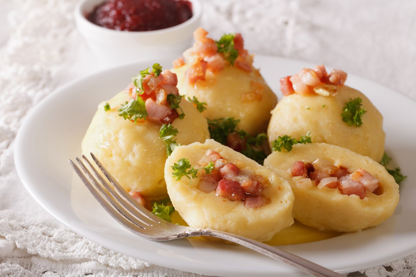 A plate of kroppkakor, a type of potato dumpling filled with pork 