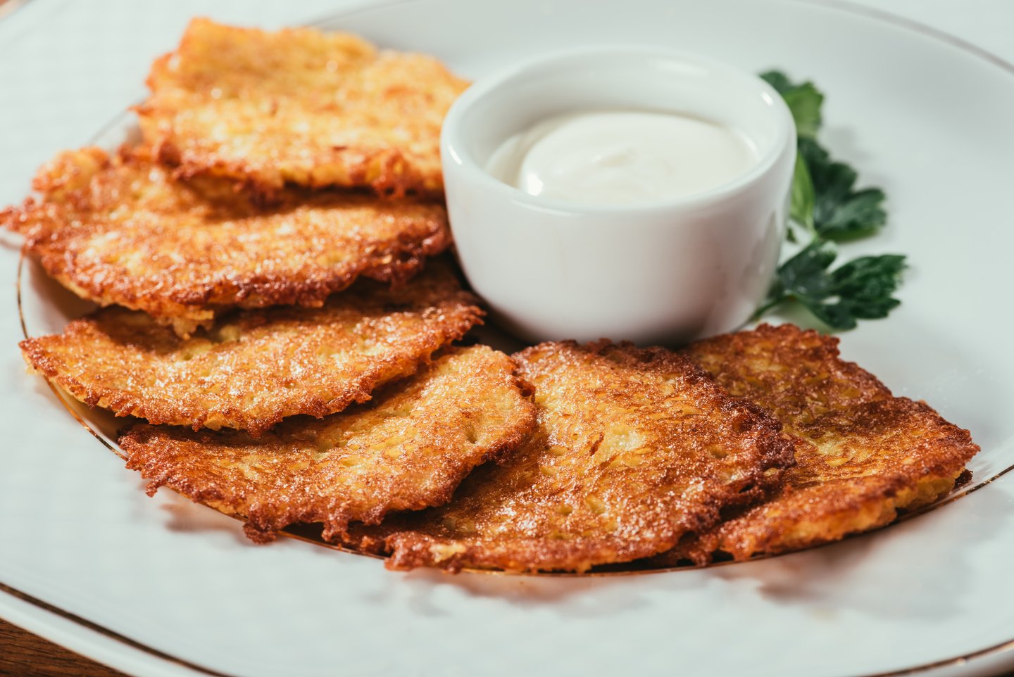 Zemiakové Placky, a Slovak potato pancake, served with sour cream
