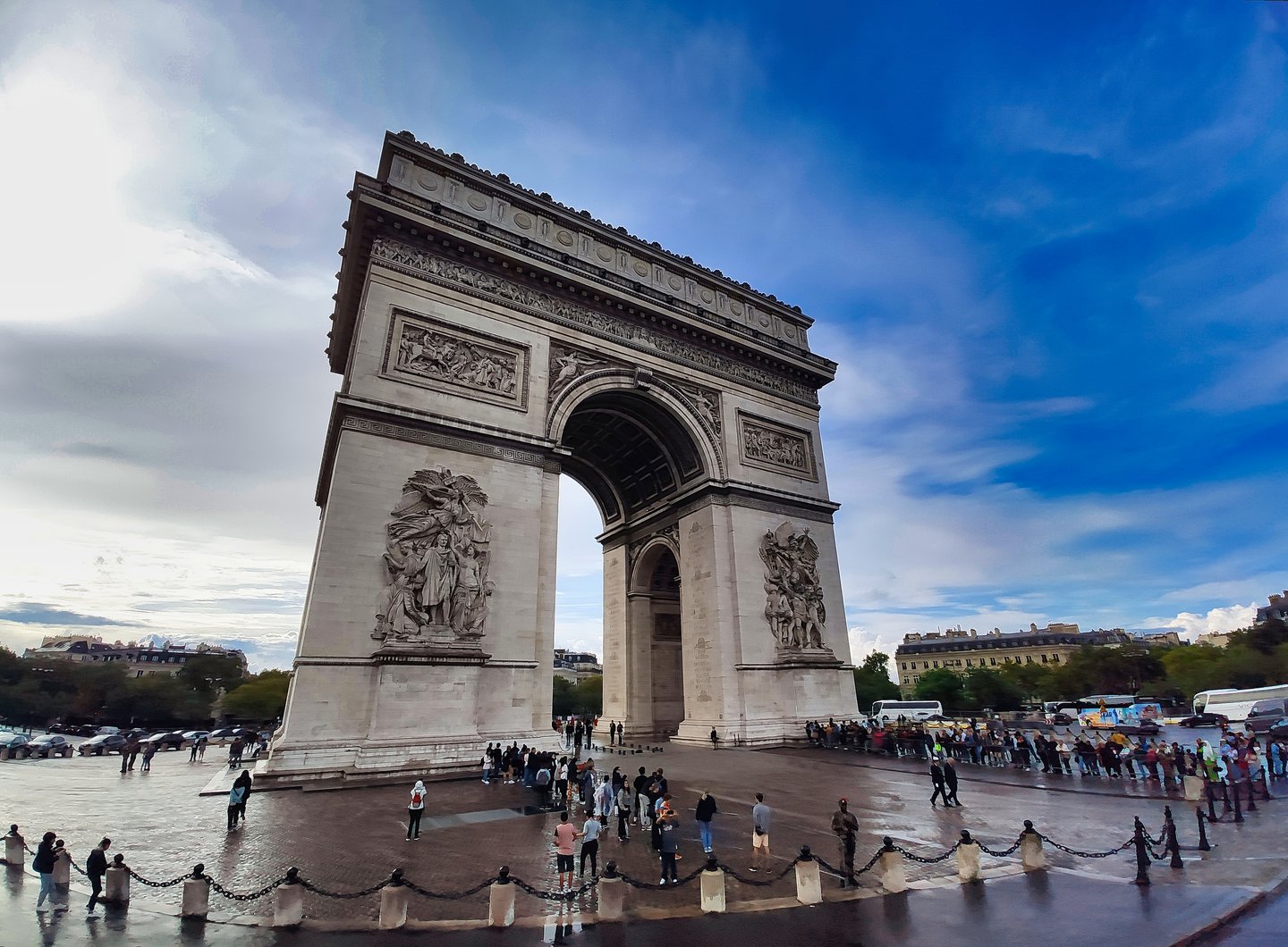 People at the base of the Arc de Triomphe in Paris