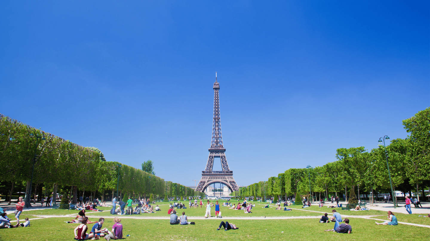 A sunny day on Champ de Mars next to the Eiffel Tower