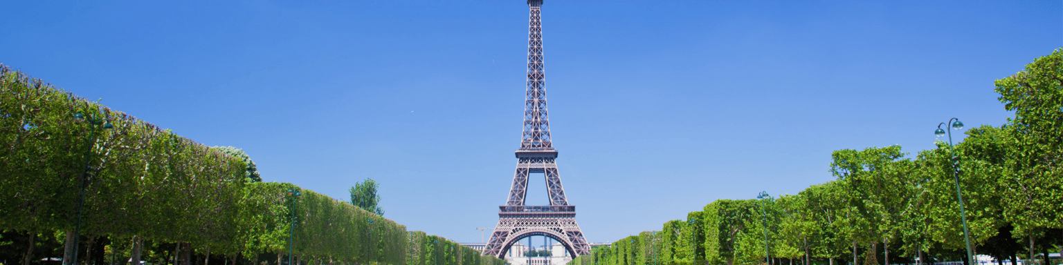 A sunny day on Champ de Mars next to the Eiffel Tower