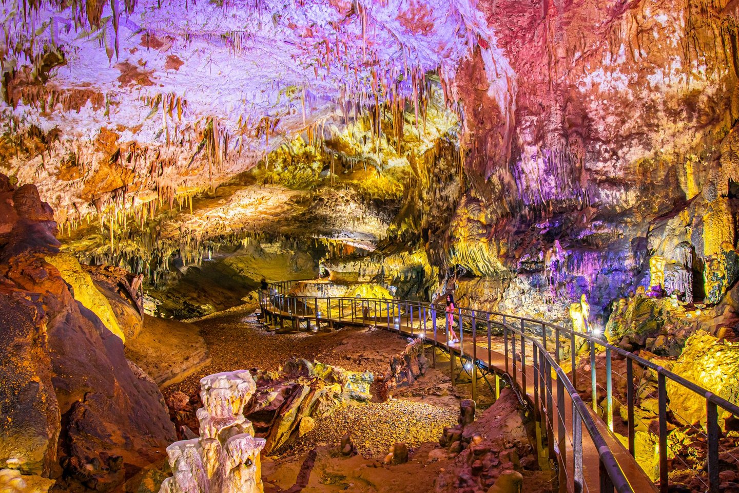 A walkway through the fascinating rock formations in the Prometheus Cave, Georgia