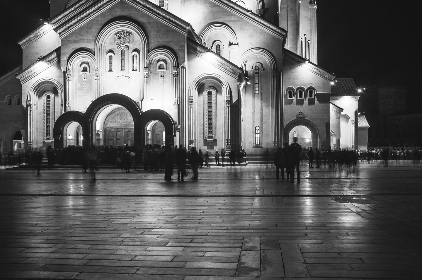 Silhouettes of people near the Trinity Cathedral in Tbilisi on Easter night.